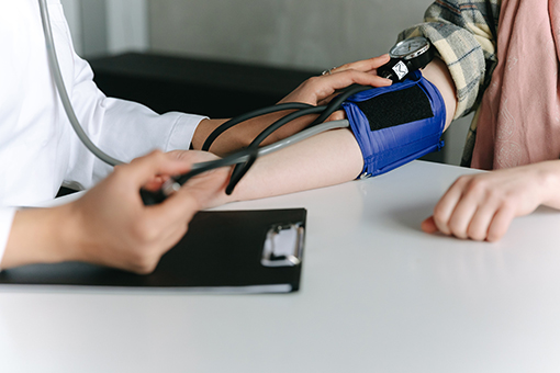 Healthcare Professional Taking Blood Pressure of Tampa Patient at an Affordable Rate