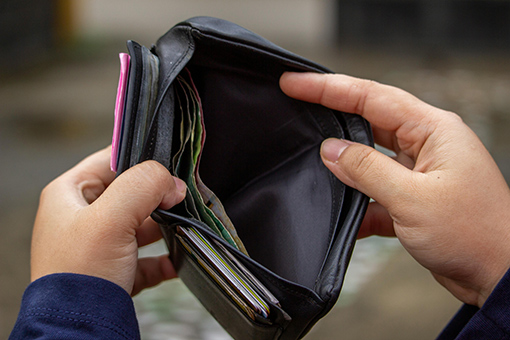 Wallet of a Man In Need of Affordable Primary Care in Tampa Florida